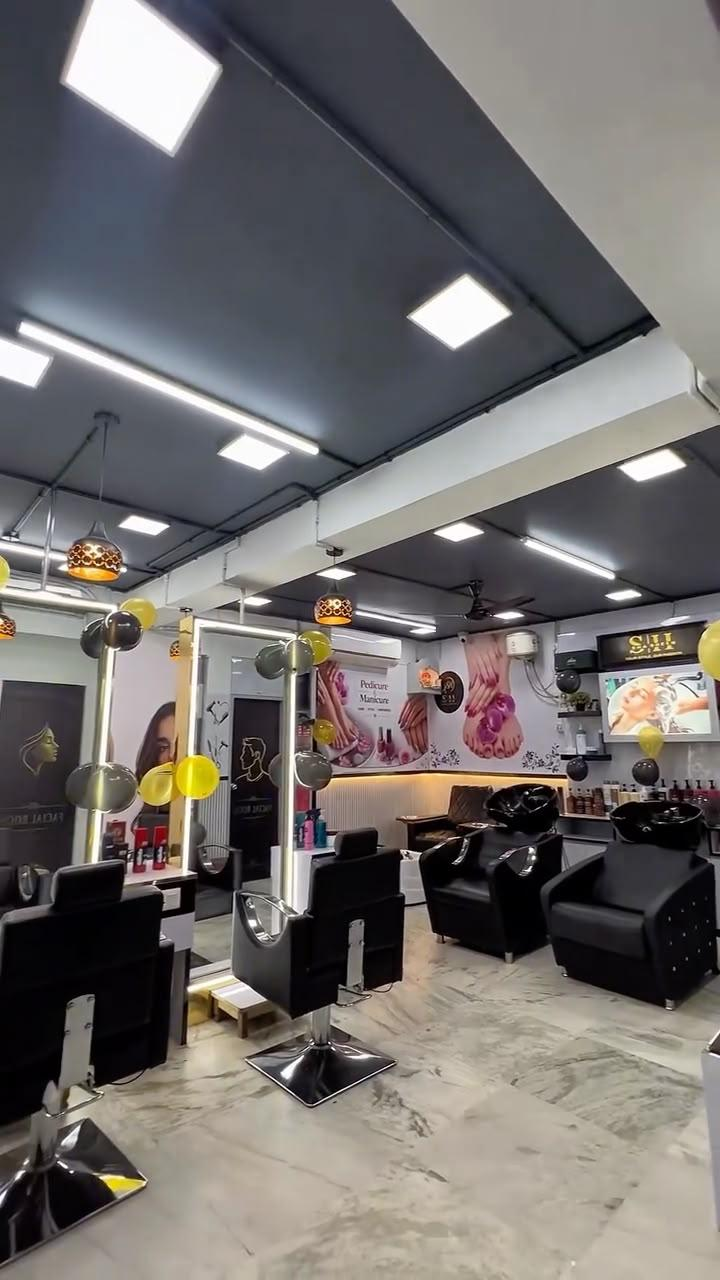 The SHA SHEEN salon floor with styling chairs, mirrors and seating