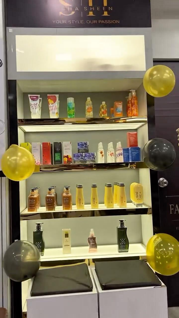 Illuminated product shelf under the SHA SHEEN signage