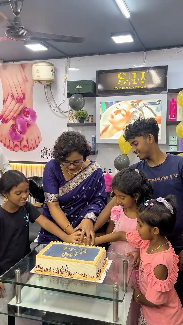 Cake cutting inside the SHA SHEEN salon